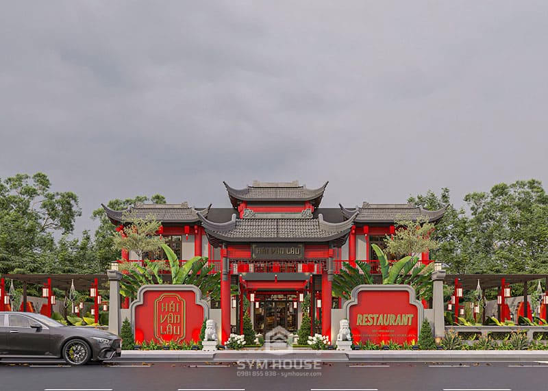Cổng chào với hệ mái cong uyển chuyển kết hợp với biển hiểu “Hải Vân Lâu” màu vàng nổi bật trên nền nâu
